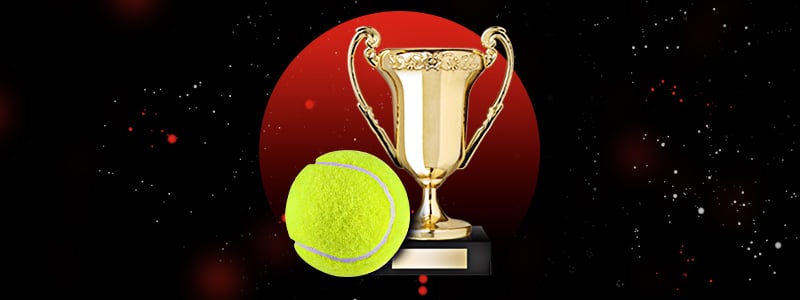 tennis ball and trophy from a tournament