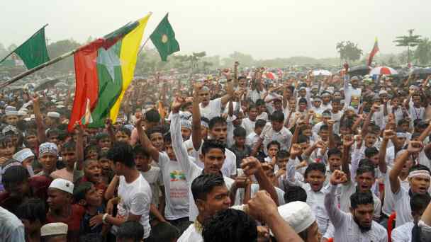 Rohingya&nbsp;refugees in Cox's Bazar shout slogans to mark the seventh anniversary of their fleeing to Bangladesh from neighboring Myanmar to escape a military crackdown in 2017.