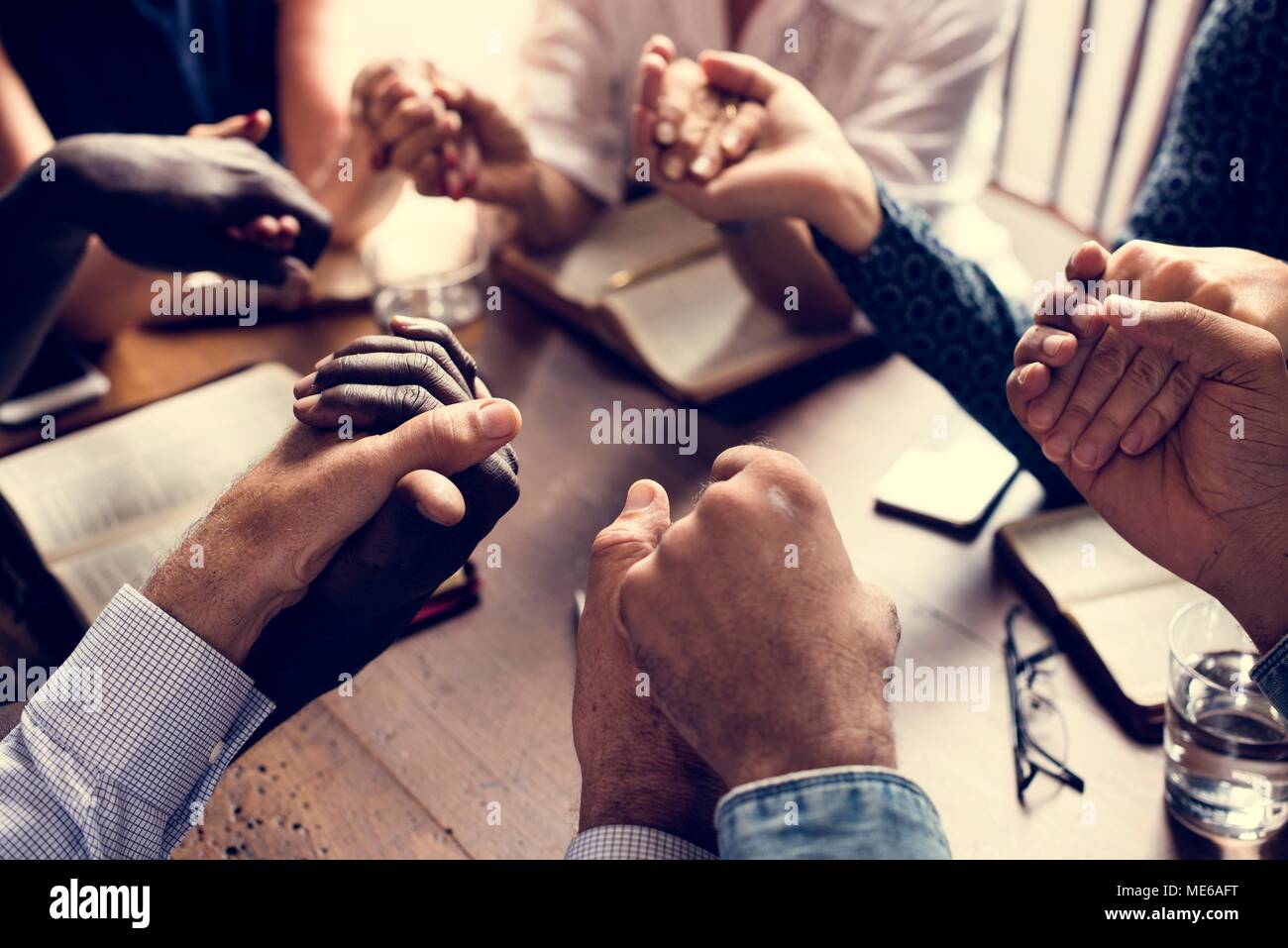 Group Praying Hands