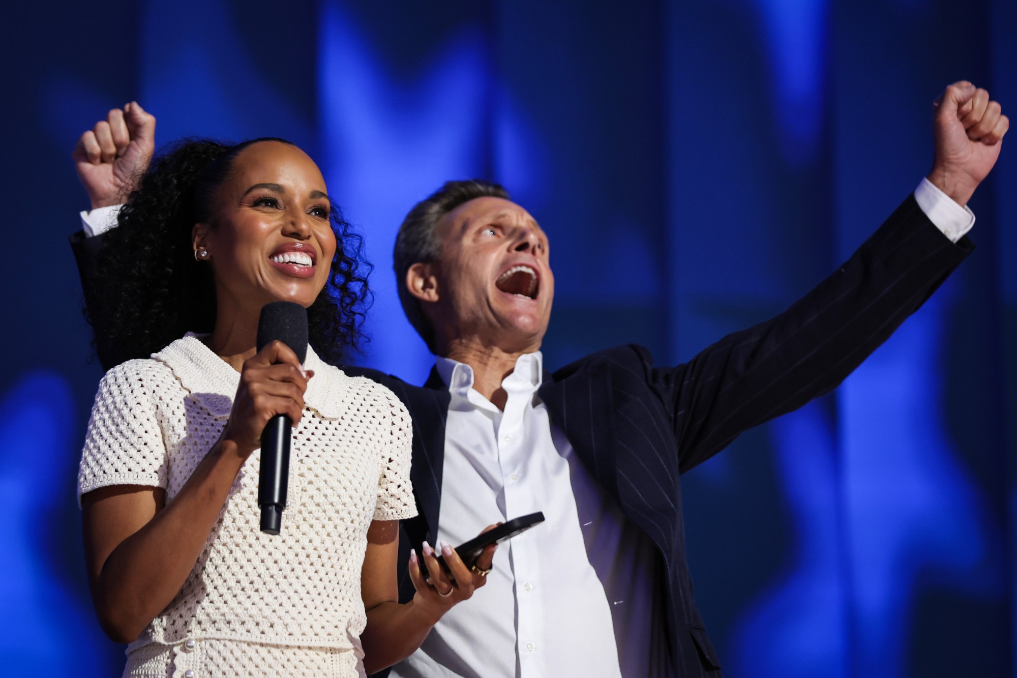 Actors Tony Goldwyn and Kerry Washington speak on stage during the final day of the Democratic National Convention at the United Center on August 22, 2024 in Chicago, Illinois. Delegates, politicians, and Democratic Party supporters are gathering in Chicago, as current Vice President Kamala Harris is named her party's presidential nominee. The DNC takes place from August 19-22.