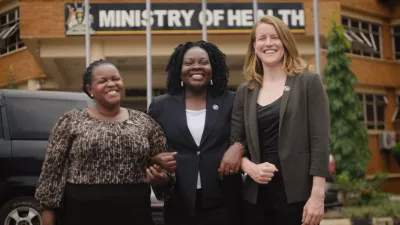 Dr. Madeleine Ballard stands alongside two community health workers, Pauline Picho Keronyai and Prossy Muyingo