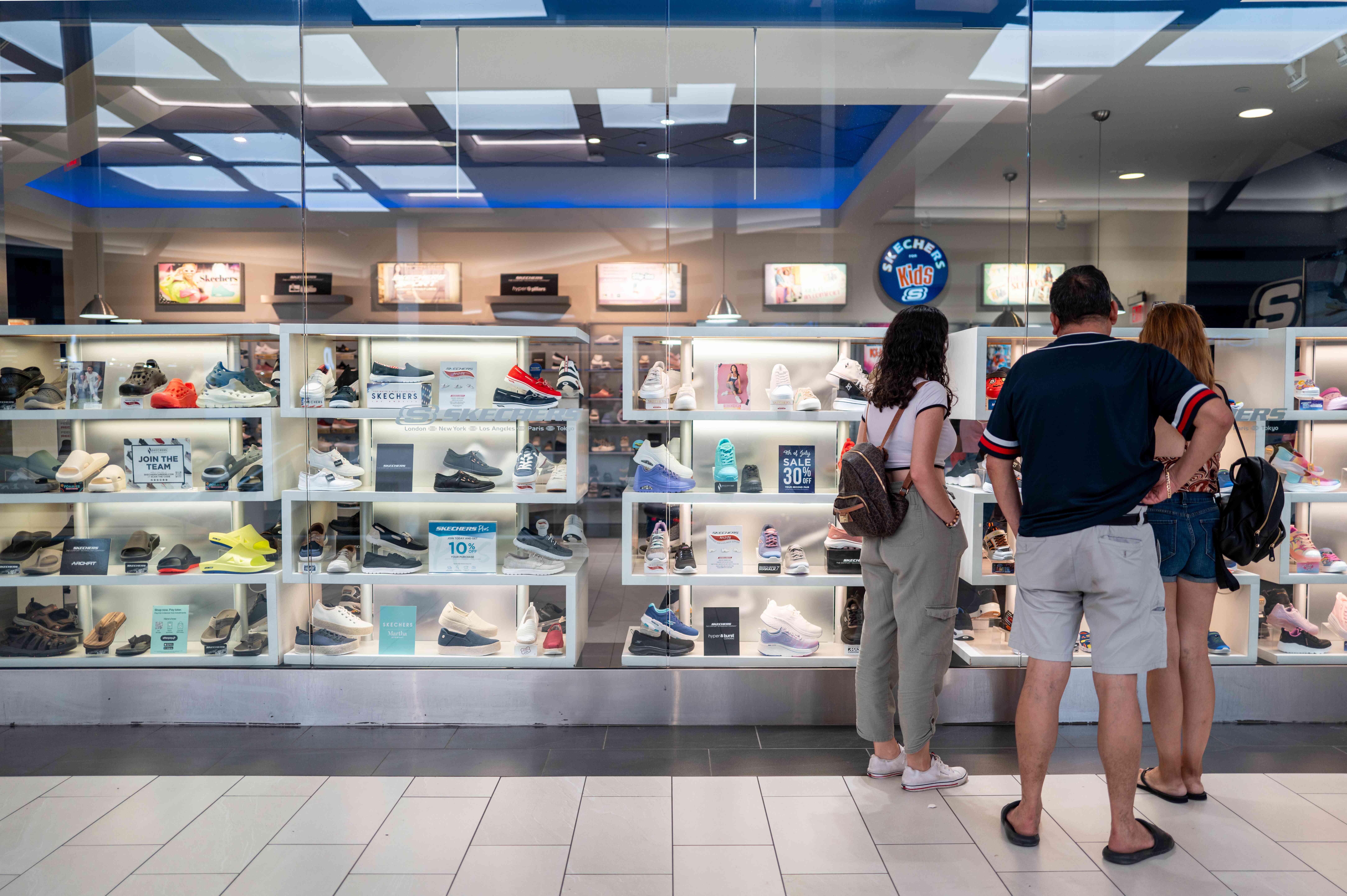 Shoppers view shoes at a Sketchers retail store at the Barton Creek Square Mall on July 16, 2024 in Austin, Texas.
