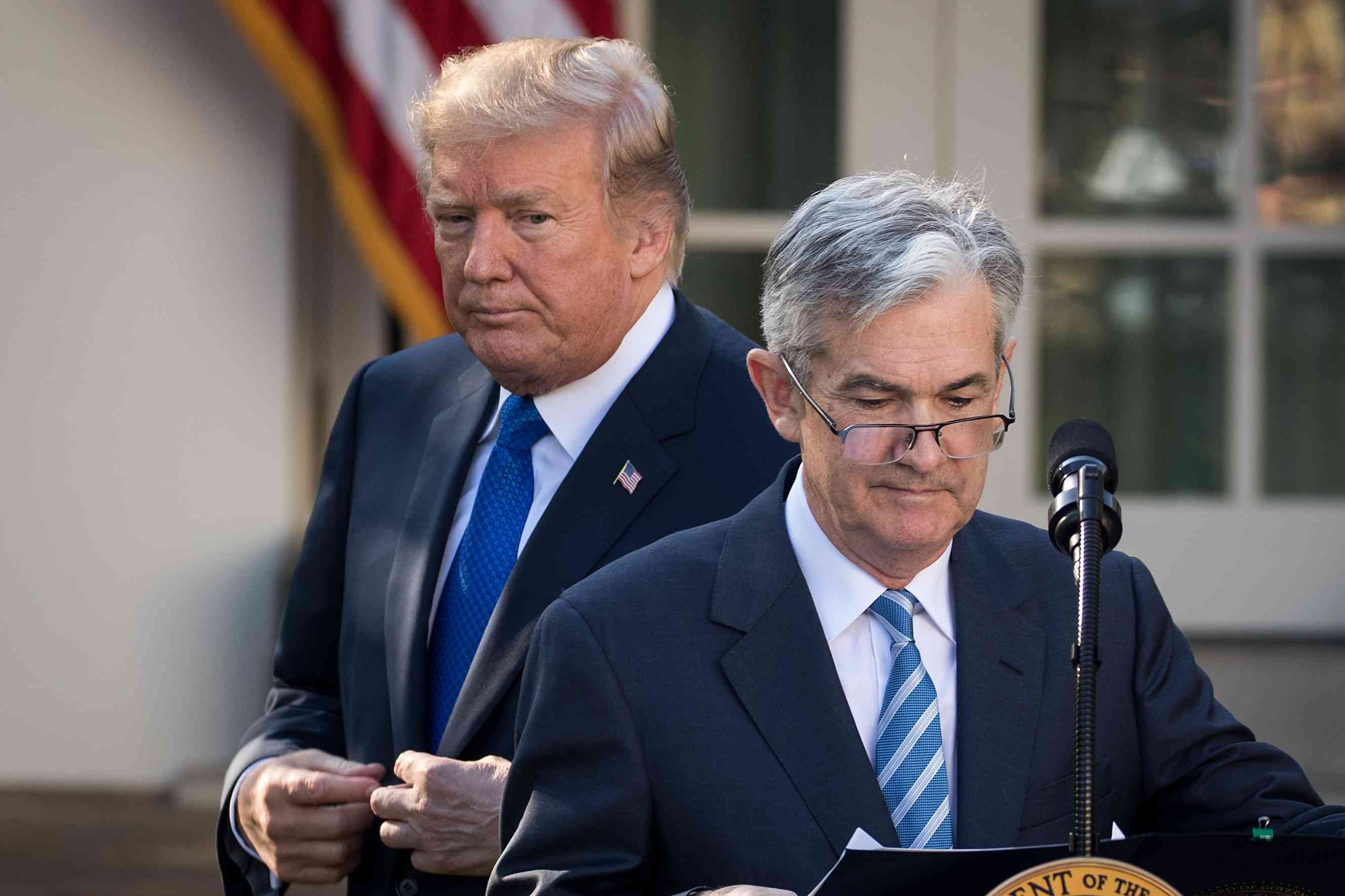 U.S. President Donald Trump looks on as his nominee for the chairman of the Federal Reserve Jerome Powell takes to the podium during a press event in the Rose Garden at the White House, November 2, 2017 in Washington, DC. 