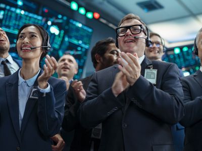 Traders cheering on the floor of an Exchange