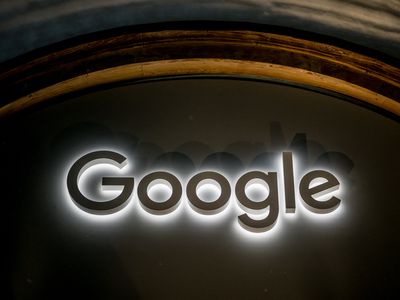 An image of Google's logo in white light against a dark background.