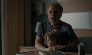 Billy Crystal holds Jacobi Jupe in 'Before,' the Apple series