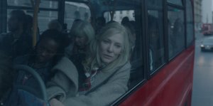 Cate Blanchett as Catherine Ravenscroft in 'Disclaimer,' shown here riding a red bus with her head leaning against the glass