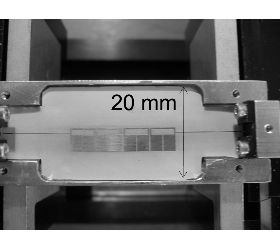 DESIGN OF BAND-PASS FILTERS USING STEPPED IMPEDANCE RESONATORS WITH FLOATING CONDUCTORS