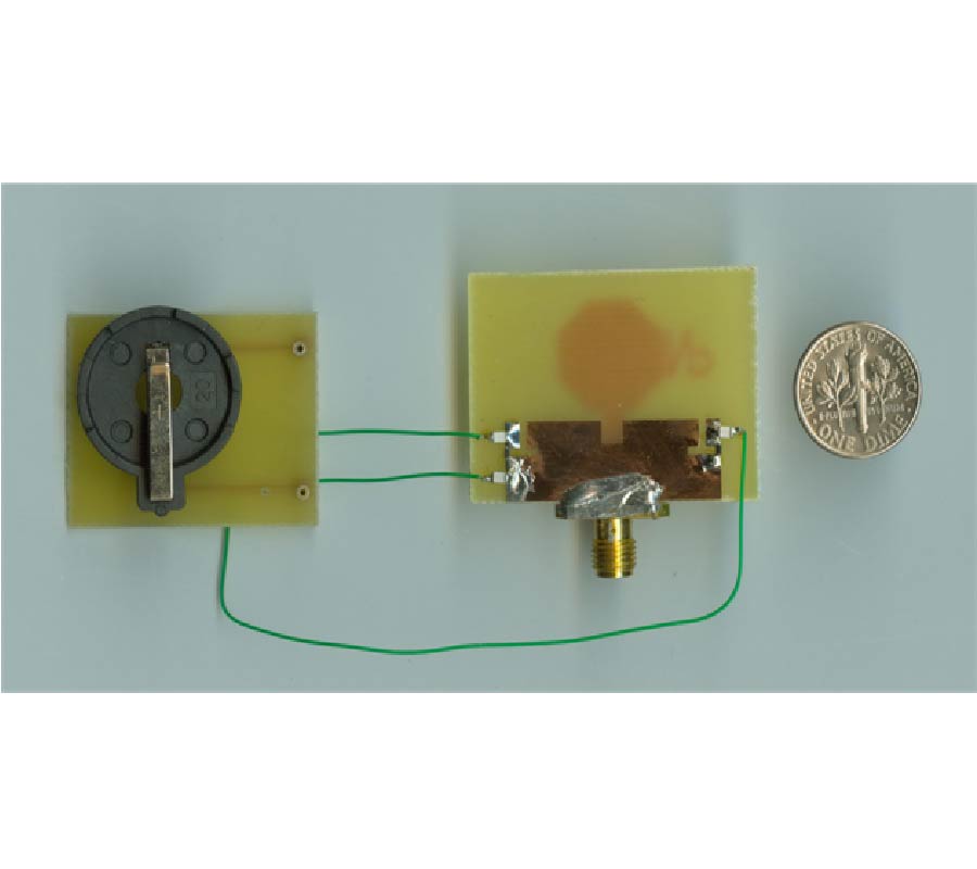 ULTRA WIDEBAND POWER DIVIDER USING TAPERED LINE