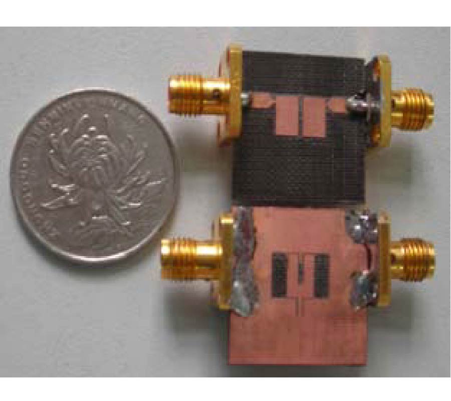 COMPACT UWB FILTER BASED ON SURFACE-COUPLED STRUCTURE WITH DUAL NOTCHED BANDS