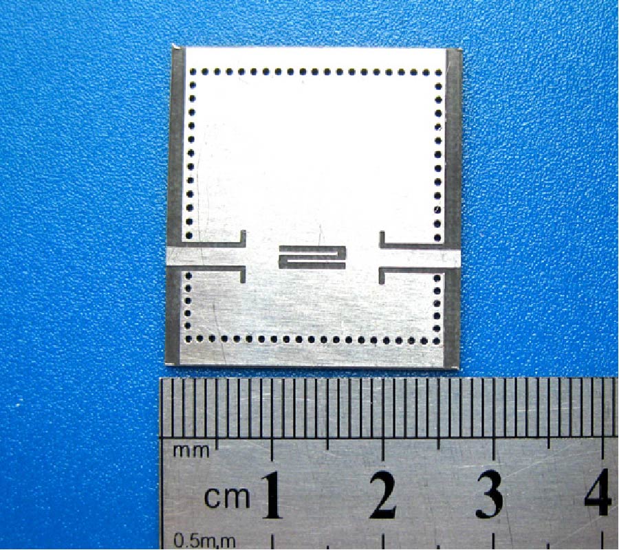 A NOVEL DUAL MODE SUBSTRATE INTEGRATED WAVEGUIDE FILTER WITH MIXED SOURCE-LOAD COUPLING (MSLC)