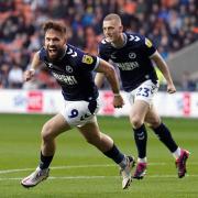 Tom Bradshaw celebrates a goal for Millwall