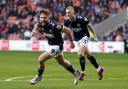 Tom Bradshaw celebrates a goal for Millwall