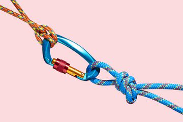 Two coloured ropes tied to a carabiner