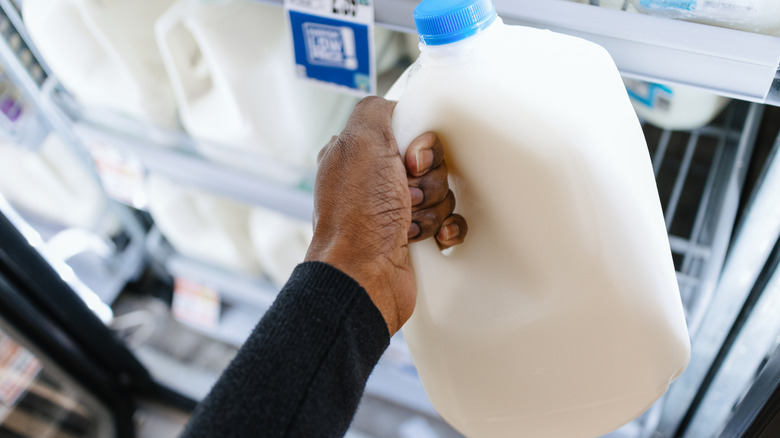 woman shopping for milk