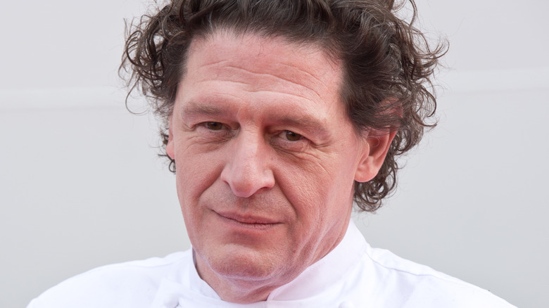 Closeup of Marco Pierre White in chef coat