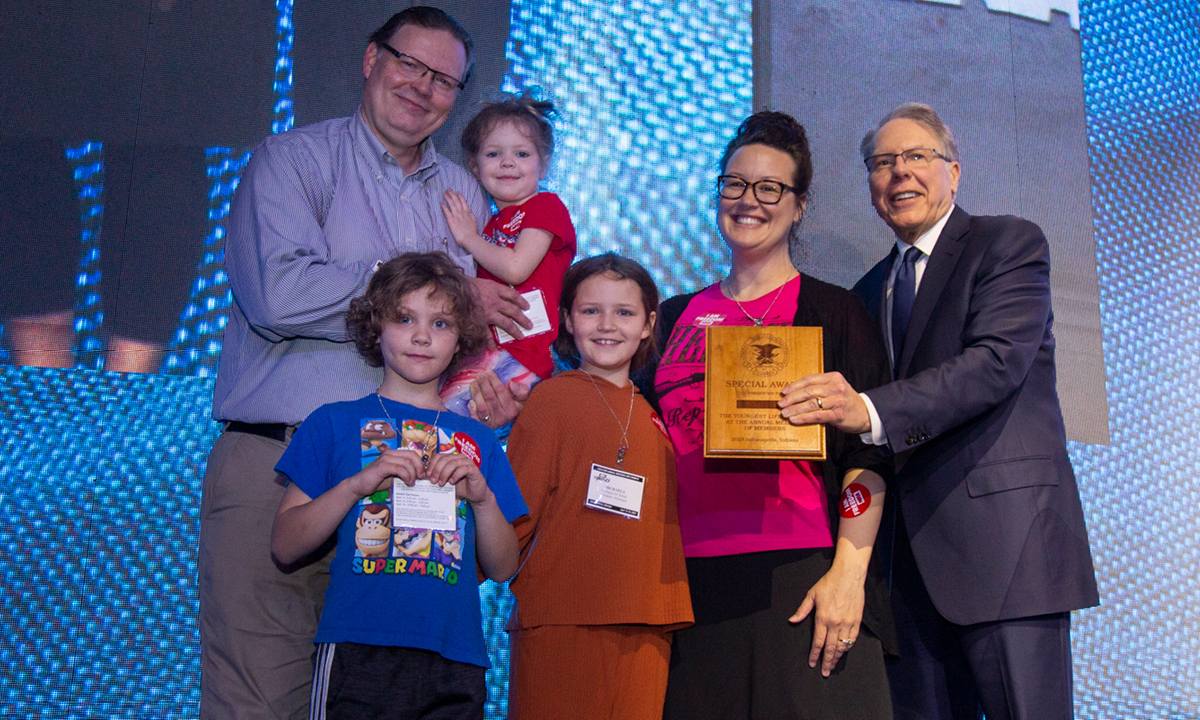 The youngest NRA member photographed with Wayne Lapierre at the Annual Meeting of Members