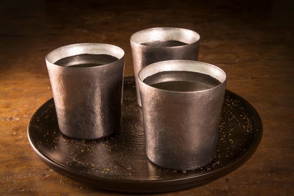 Hand-hammered titanium water cups made by artisans at SUS Gallery of Niigata