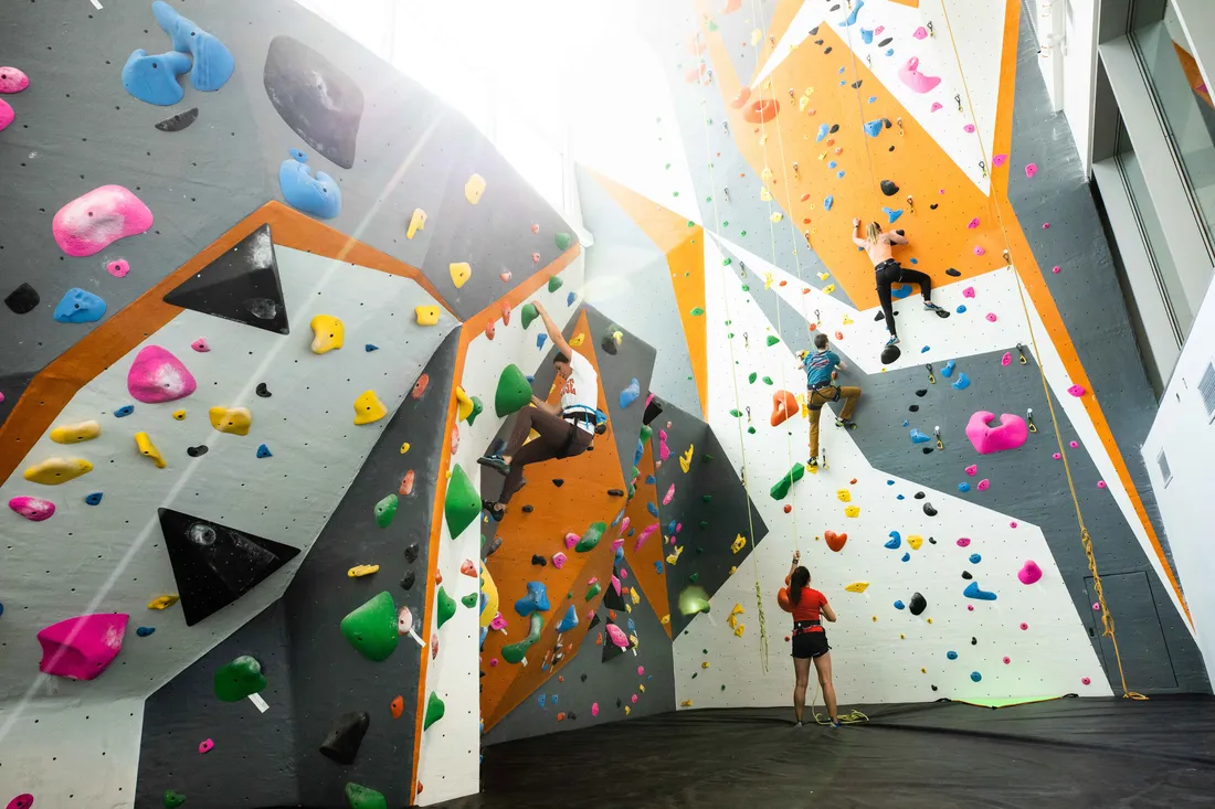 Student rock climbing at the The Barnes Center.