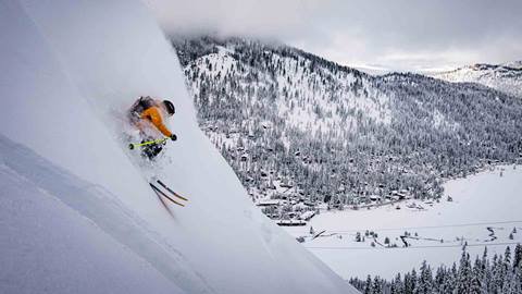 Connery Lundin skis down Resort Chair terrain on a powder day.