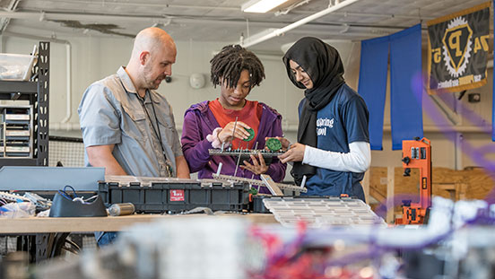 Purdue University students learning in a workshop.