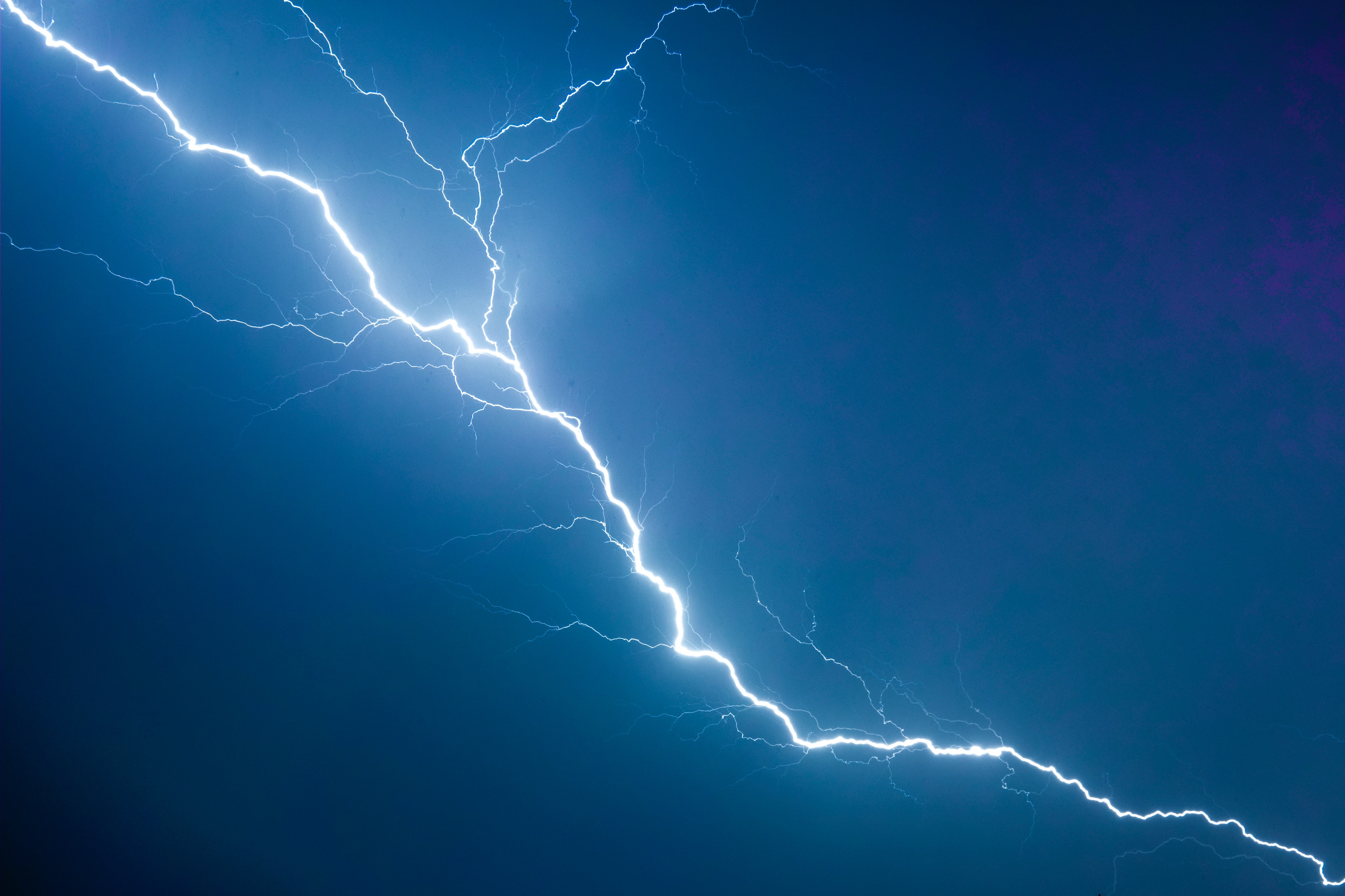 Lighting bolt stretching across the sky.