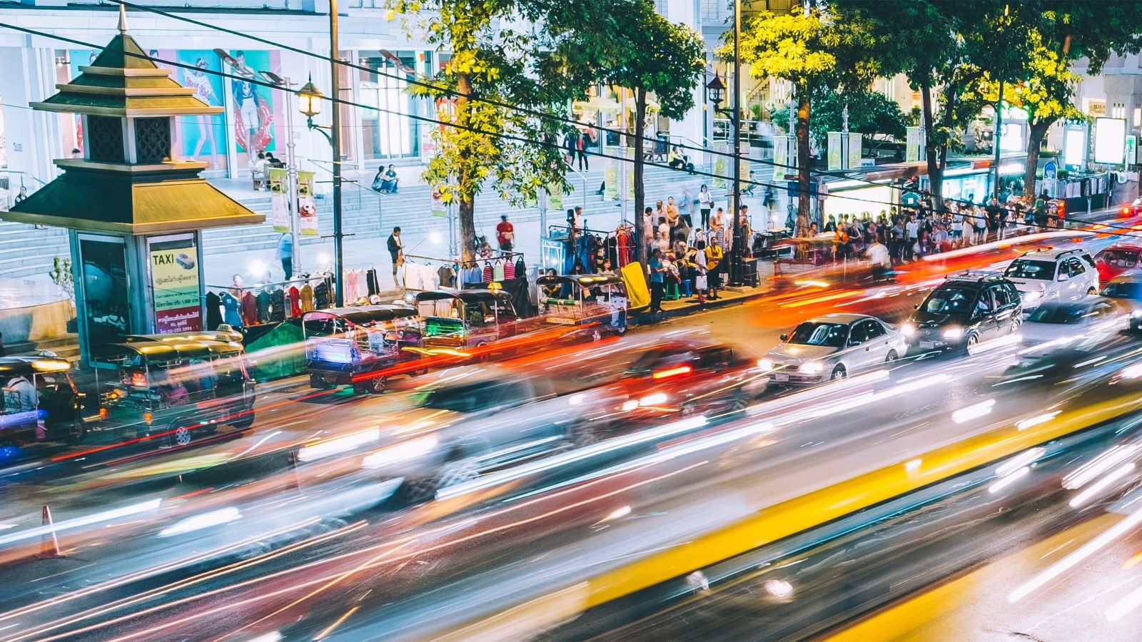 A Bangkok street at night taken over a long exposure.