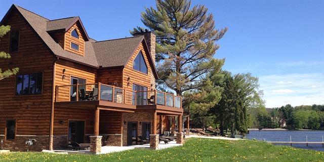 Lake Delton Waterfront Villas on the waterfront with a pier.