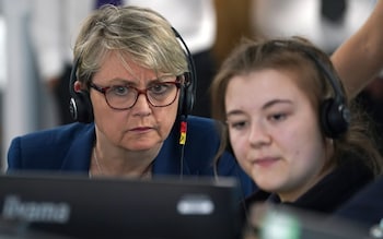 Yvette Cooper meets 999 control handlers during a visit to Kent Police