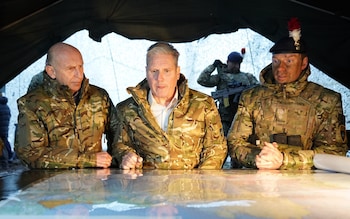 Sir Keir Starmer and Defence Secretary John Healey (left) meet British troops in Estonia last year