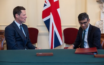 Alex Chalk and Rishi Sunak chat in 10 Downing Street in April 2023