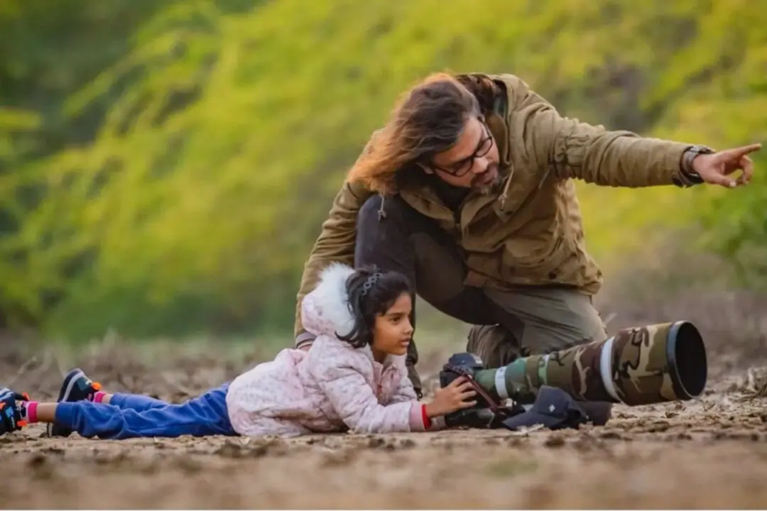 ‘Divine Light’: 9-Year-Old Takes Photo of Peahens on Misty Winter Morning, Makes It to Wildlife Photographer of the Year Awards