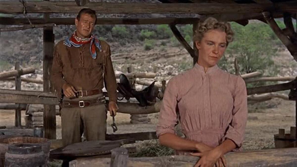 Hondo (John Wayne) gradually becomes protective of Angie Lowe (Geraldine Page), in “Hondo.” (Warner Bros.)