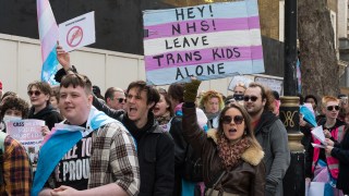 Demonstrators protest against a ban on puberty blockers in London in April