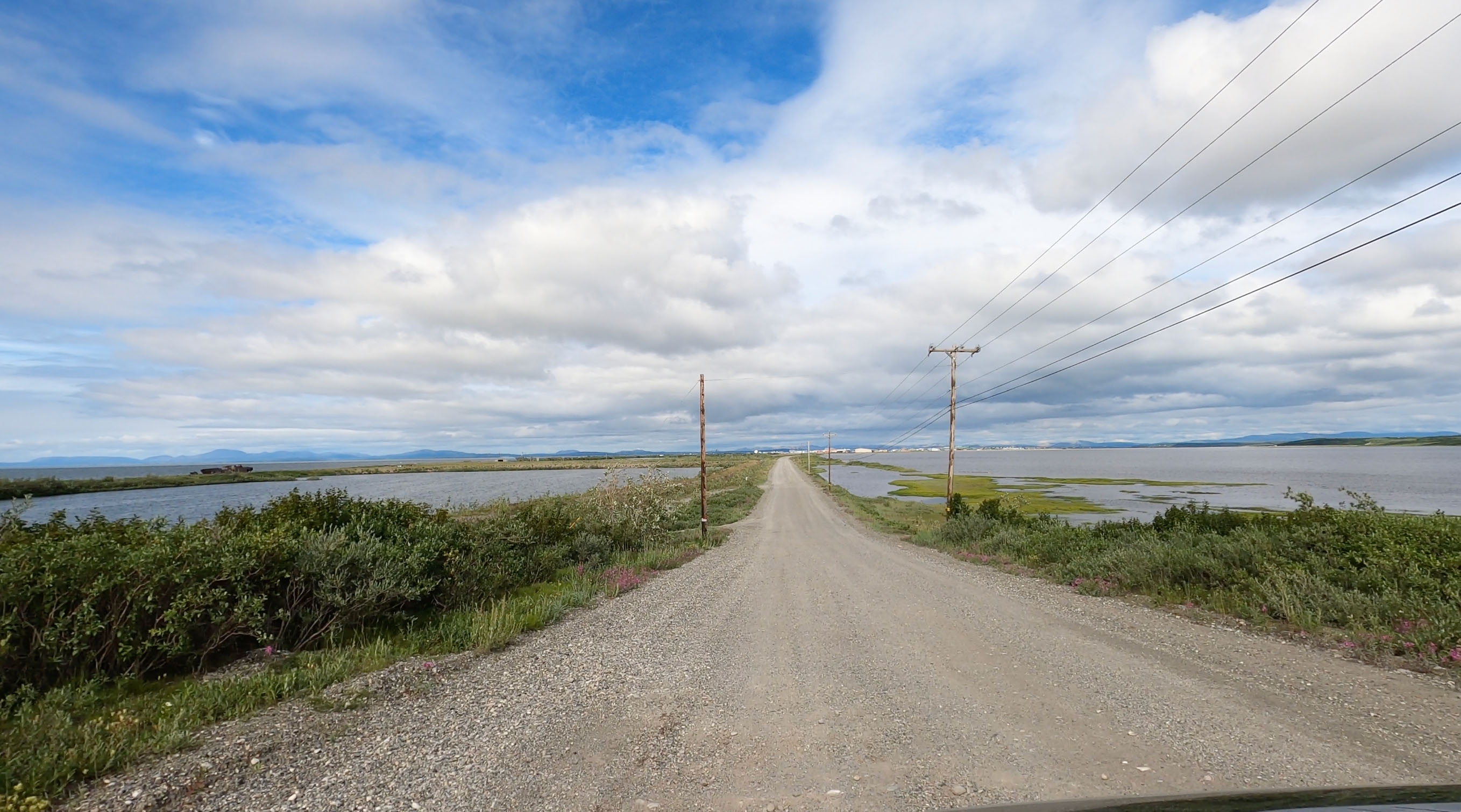 Power lines along a dirt road