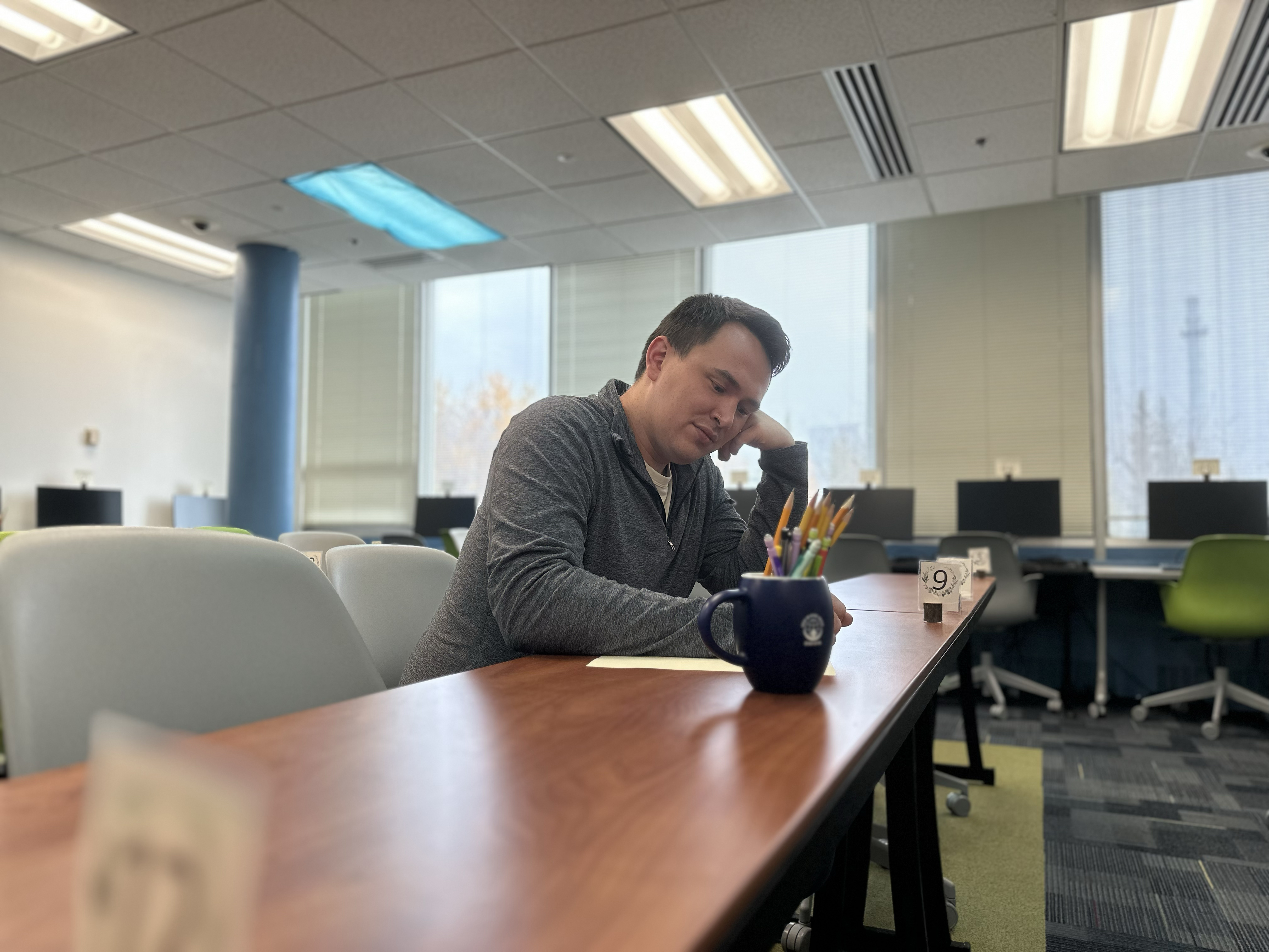 Logan Hertzler in the UAF eCampus exam room.