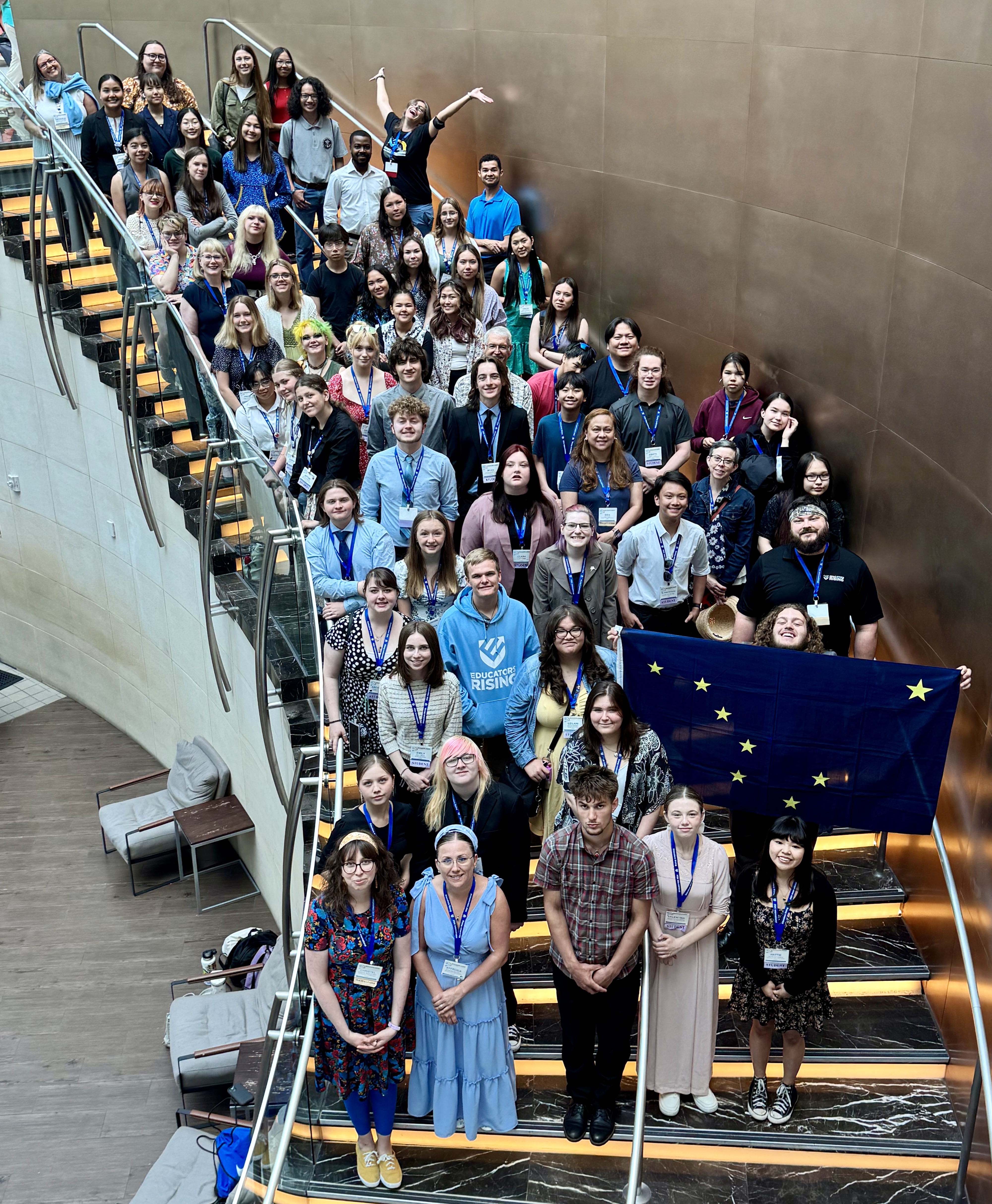 Educators Rising Alaska students, chaperones and staff on a stairwell at the National Conference.