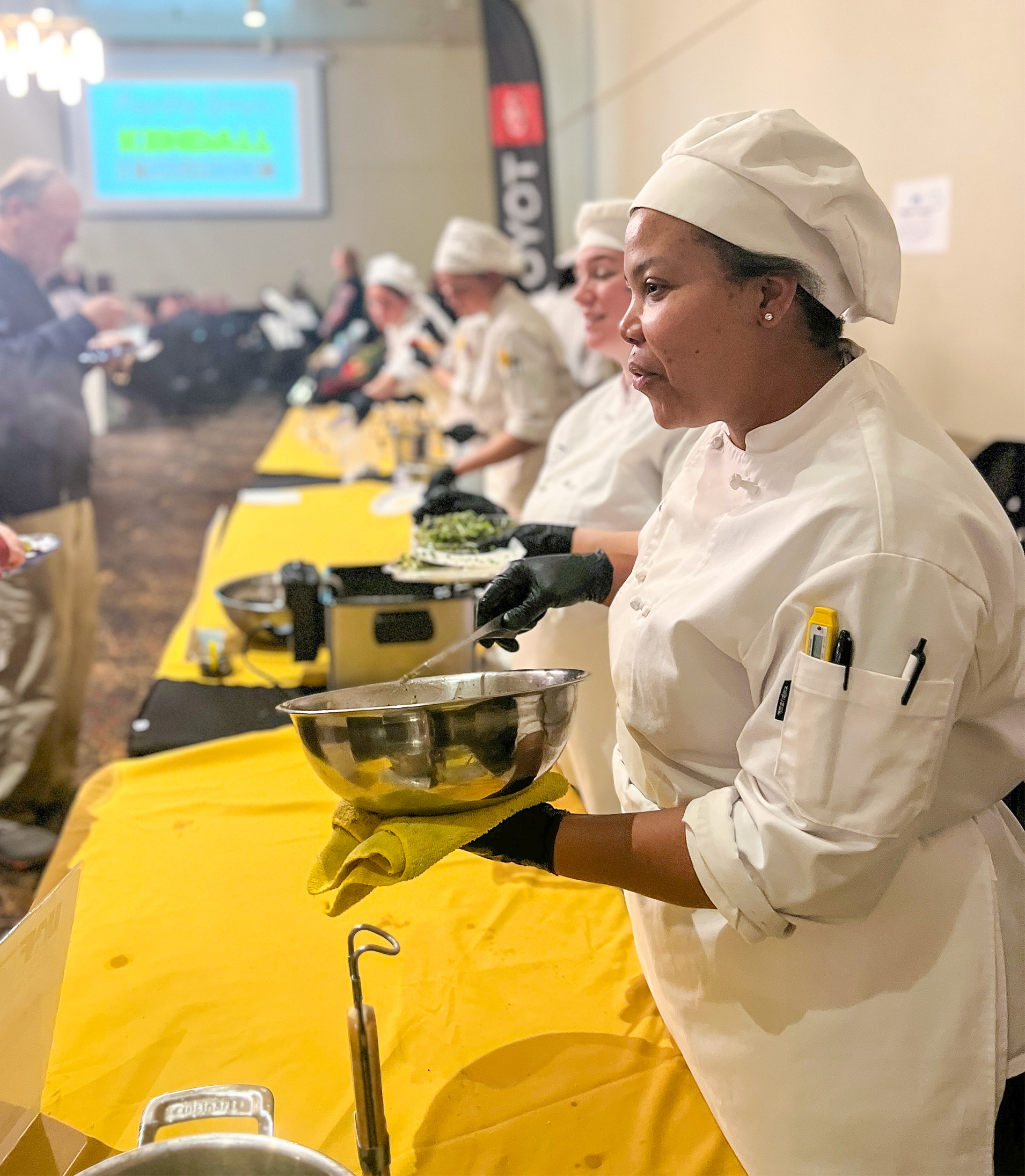 Culinary Arts and Hospitality student, Gina Henry, serves pasta at the 2023 City Sampler.