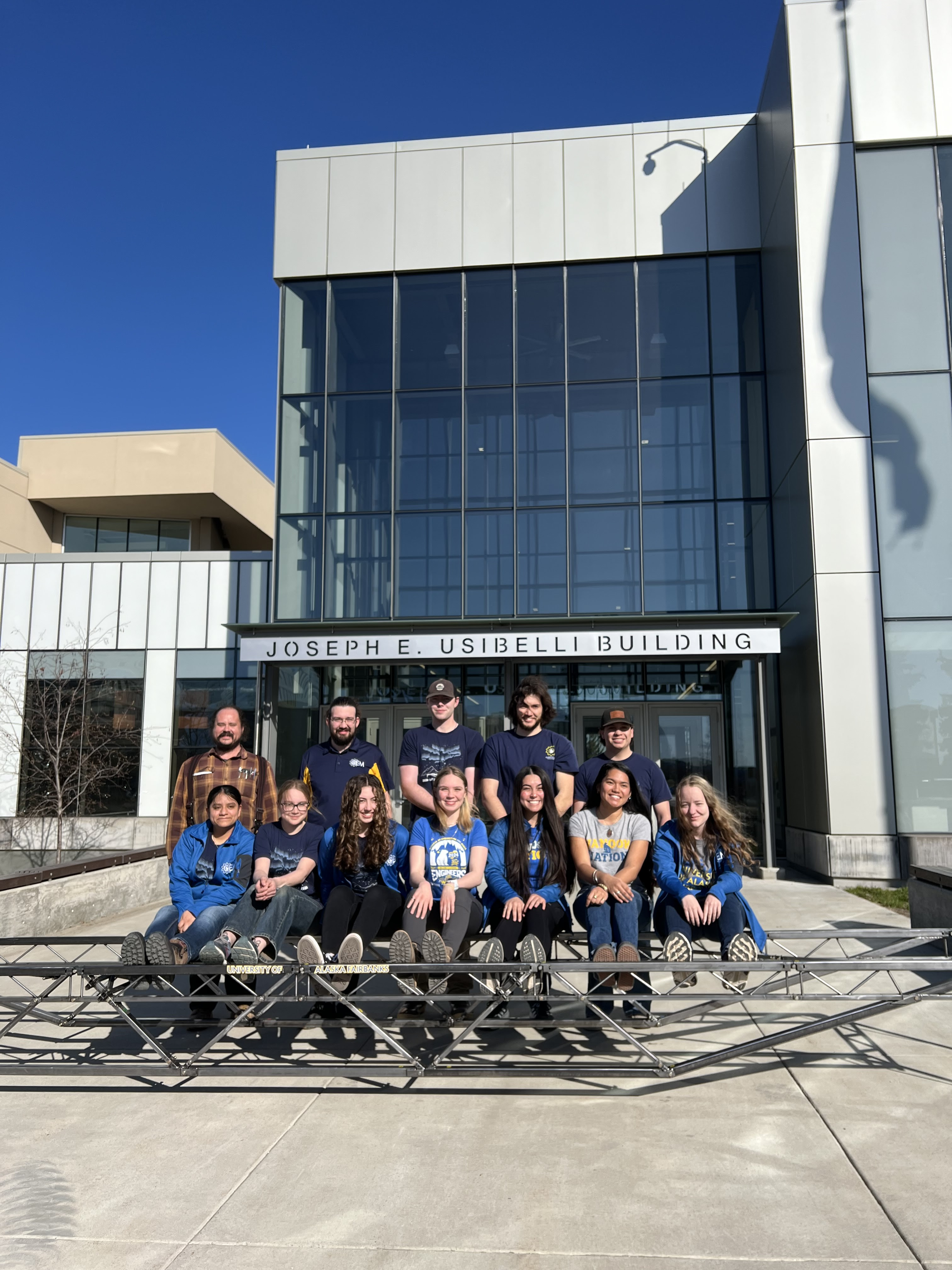 The UAF Steel Bridge competition team together outside the Usibelli Building.