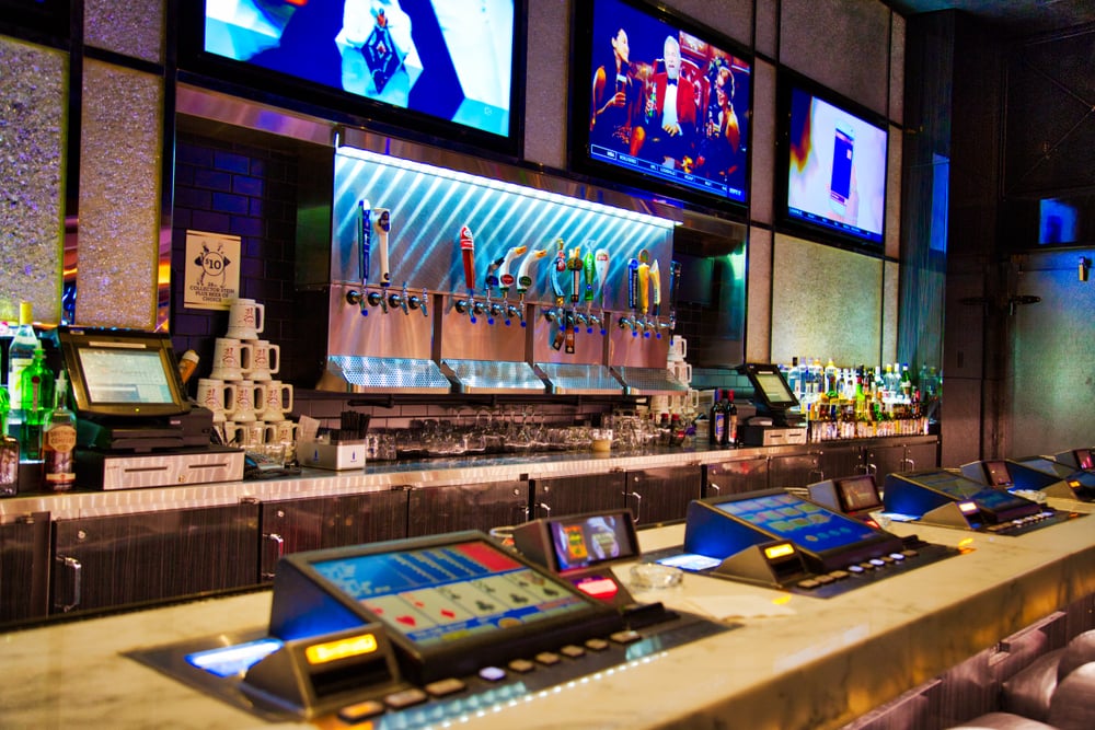 Las Vegas bar top with integrated slot machines