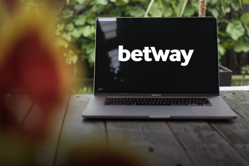 Betway logo on laptop