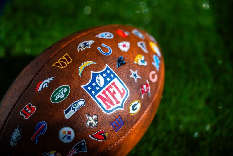 NFL football with team logos