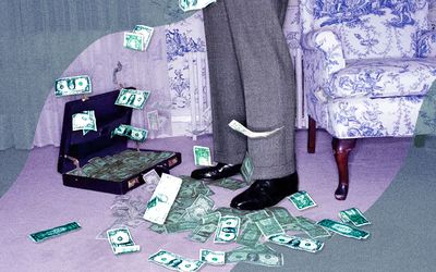 Dollar bills spread out across the floor and in a suitcase