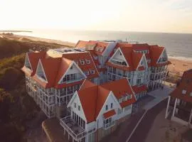 Familie beachhuis op de duinen (Duinhuis)