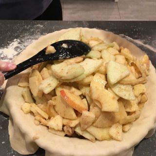 Preparing apple pie.