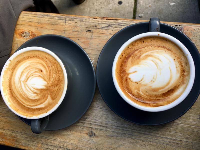 Checked in at Baker Street Coffee. Flat whites outdoors — with Jessica