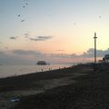 Walking along the beach at dusk.