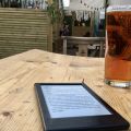 In a beer garden. With beer (and a book). 🍺 📖