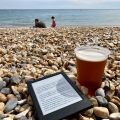 A beer and a book on the beach while @wordridden gets her second jab. 🍺 📖 🏖 💉