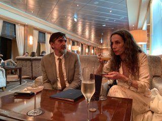 Dan and Sue looking stylish as they drink cocktails on board the Queen Mary 2.